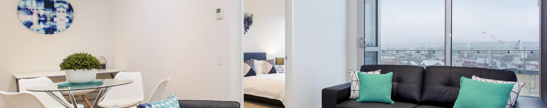 Adelaide Morphett 2 bed corporate apartment lounge
