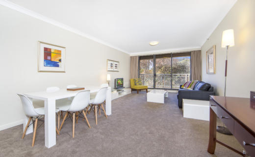 Sydney Elizabeth 1 bed corporate apartment dining lounge