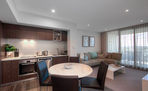 Perth Murray West 1 bed corporate apartment dining lounge