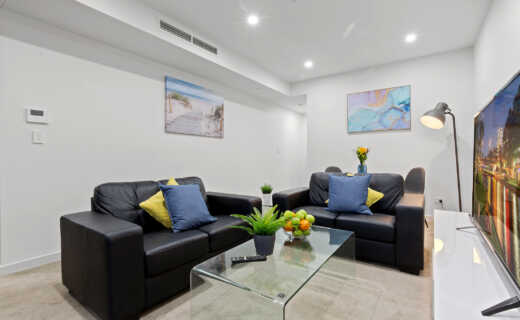 Parramatta Hassall St 1 bed corporate apartment lounge