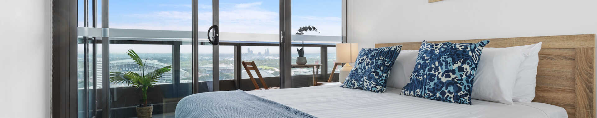 Master bedroom in long-stay accommodation Olympic Park - Astra Apartments