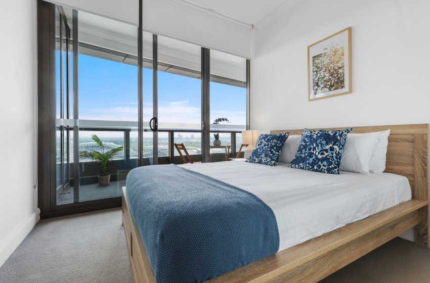 Master bedroom in long-stay accommodation Olympic Park - Astra Apartments