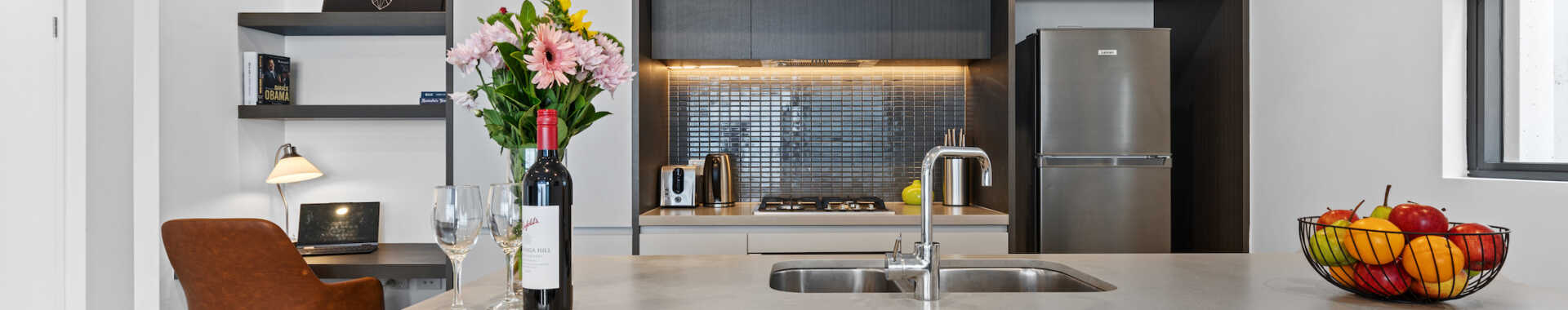 Astra Apartments Penrith Accommodation - kitchen and study desk in 2 bedroom apartment