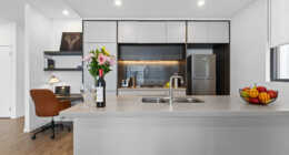 Astra Apartments Penrith Accommodation - kitchen and study desk in 2 bedroom apartment