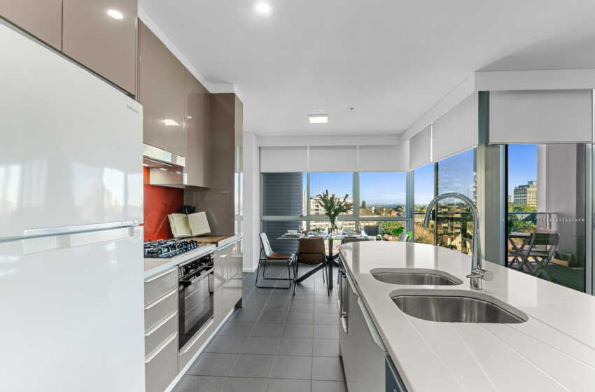 Residential sized kitchen in Astra Apartments North Sydney 2-bedroom apartment on Miller St